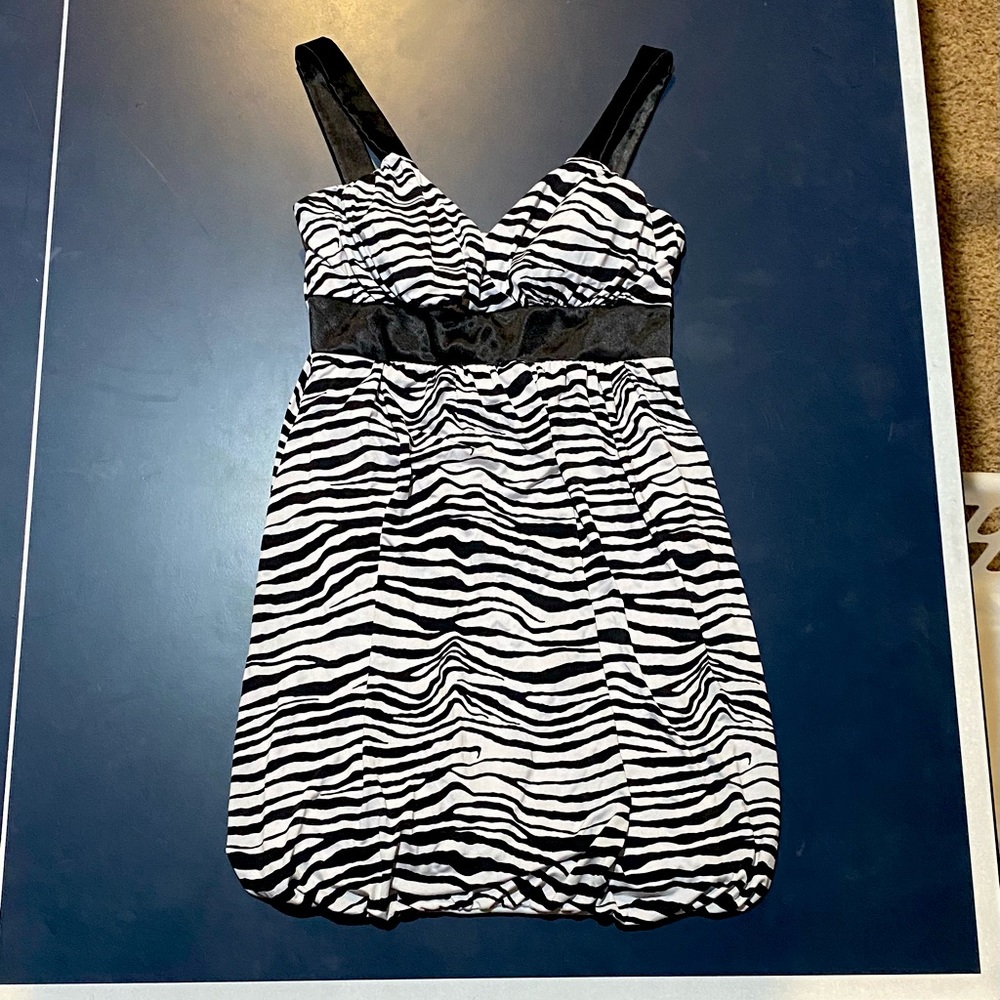 Black and white striped Taboo tunic.